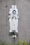 909221 Afbeelding van het Christusbeeld in de toren van de voormalige Heilig Hartkerk (Oudwijk 23) te Utrecht.